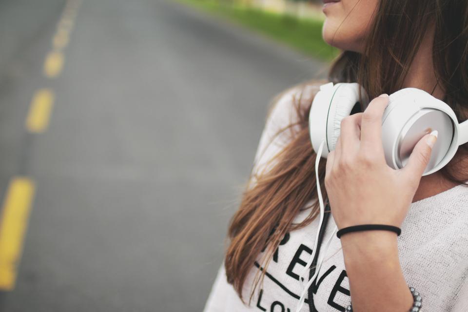 Woman listening to music with headphones